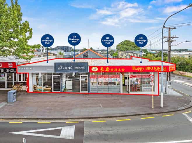 FREEHOLD CORNER SITE - FOUR SHOPS
