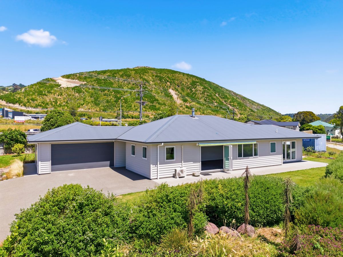 A Charming Family Home with Three-Car Garaging