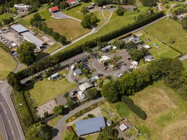 GROSS INCOME OVER $220,000 PER ANNUM 
