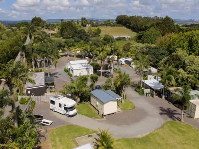 GROSS INCOME OVER $220,000 PER ANNUM 
