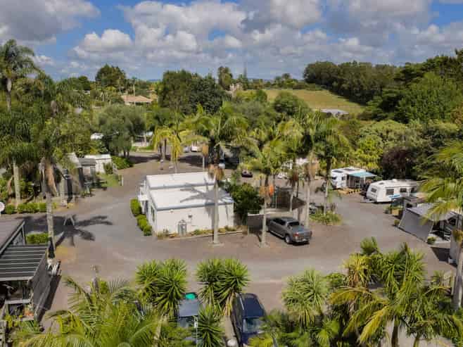 GROSS INCOME OVER $220,000 PER ANNUM 
