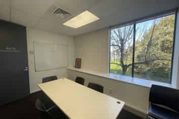 Well-located office with fitout & parking