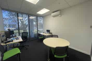 Well-located office with fitout & parking