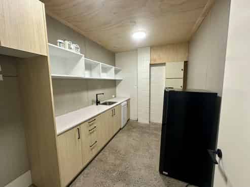 Kingsland showroom with roller door access