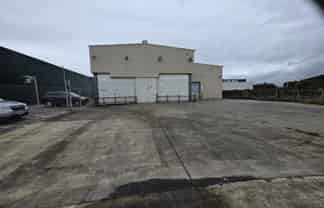 Warehouse space with generous yard area + parking