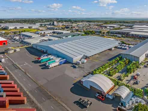 Generous Warehouse & Yard with 12 Roller Doors