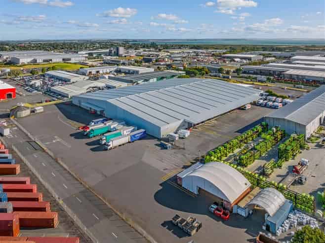 Generous Warehouse & Yard with 12 Roller Doors