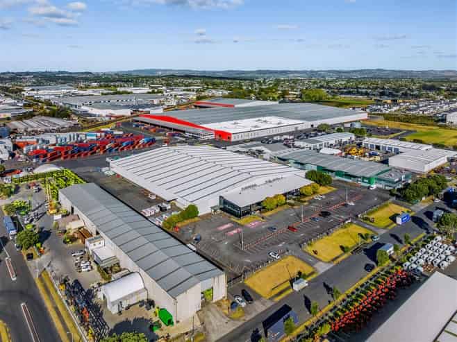 Generous Warehouse & Yard with 12 Roller Doors