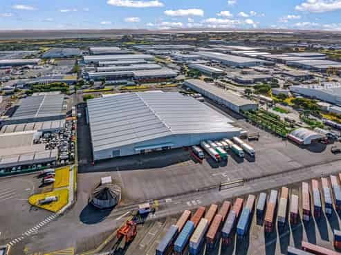 Generous Warehouse & Yard with 12 Roller Doors