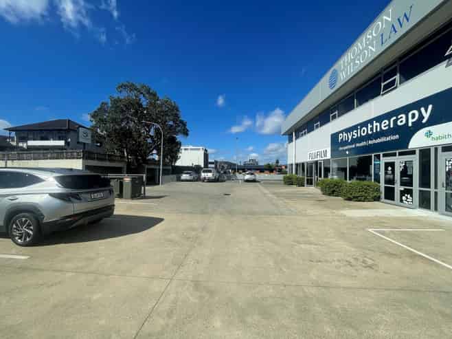 A grade office + 8 carparks!