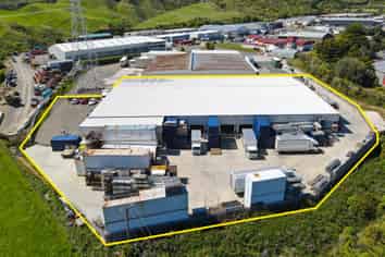 Big Warehouse Surrounded by Yard