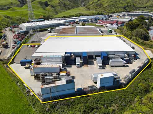 Big Warehouse Surrounded by Yard