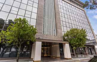 Light-Filled Corner Office with Private Balcony