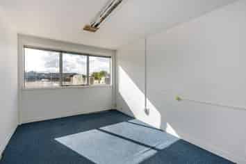 Top floor above Harcourts available now 