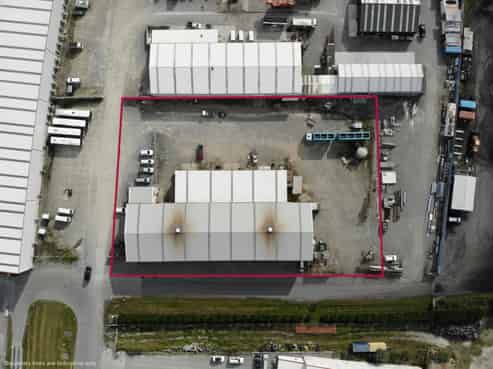 Engineering workshop or storage with large yard