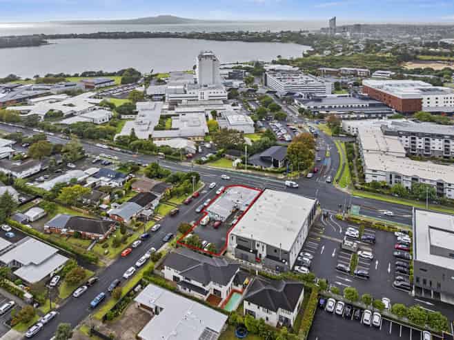 Mixed-use corner site opposite hospital