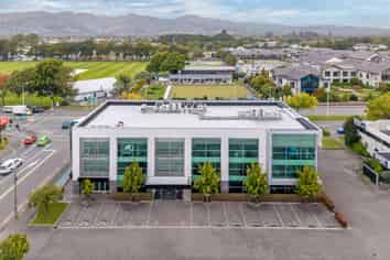 High Profile Corner Office Building + Parking