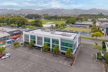 High Profile Corner Office Building + Parking