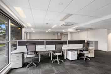 High Profile Corner Office Building + Parking