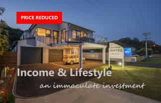 PRICE REDUCED - MODERN 9 UNIT BEACH-STRIP MOTEL