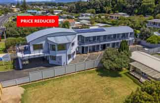 PRICE REDUCED - MODERN 9 UNIT BEACH-STRIP MOTEL