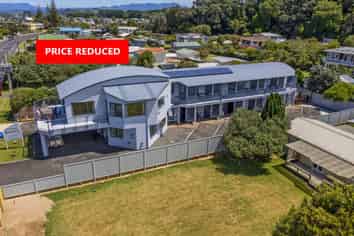 PRICE REDUCED - MODERN 9 UNIT BEACH-STRIP MOTEL