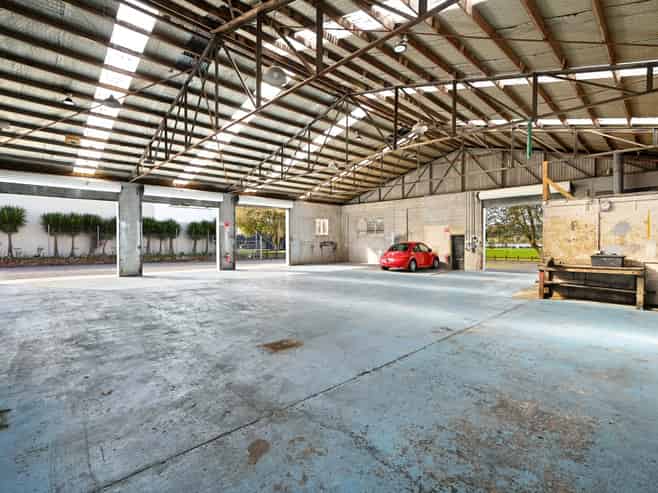 Secure warehouse with drive-through access