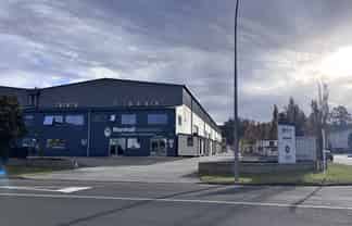Large modern warehouse on corner site