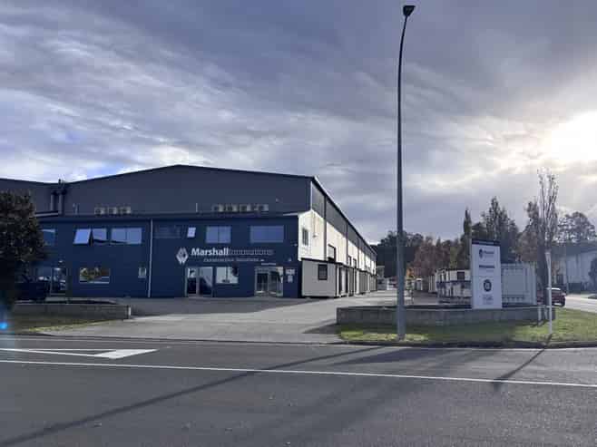 Large modern warehouse on corner site