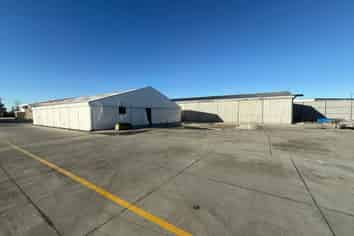 Large yard + warehouse and tent storage 