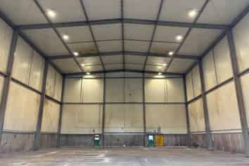 HIGH-STUD WAREHOUSE WITH HUGE SECURE YARD
