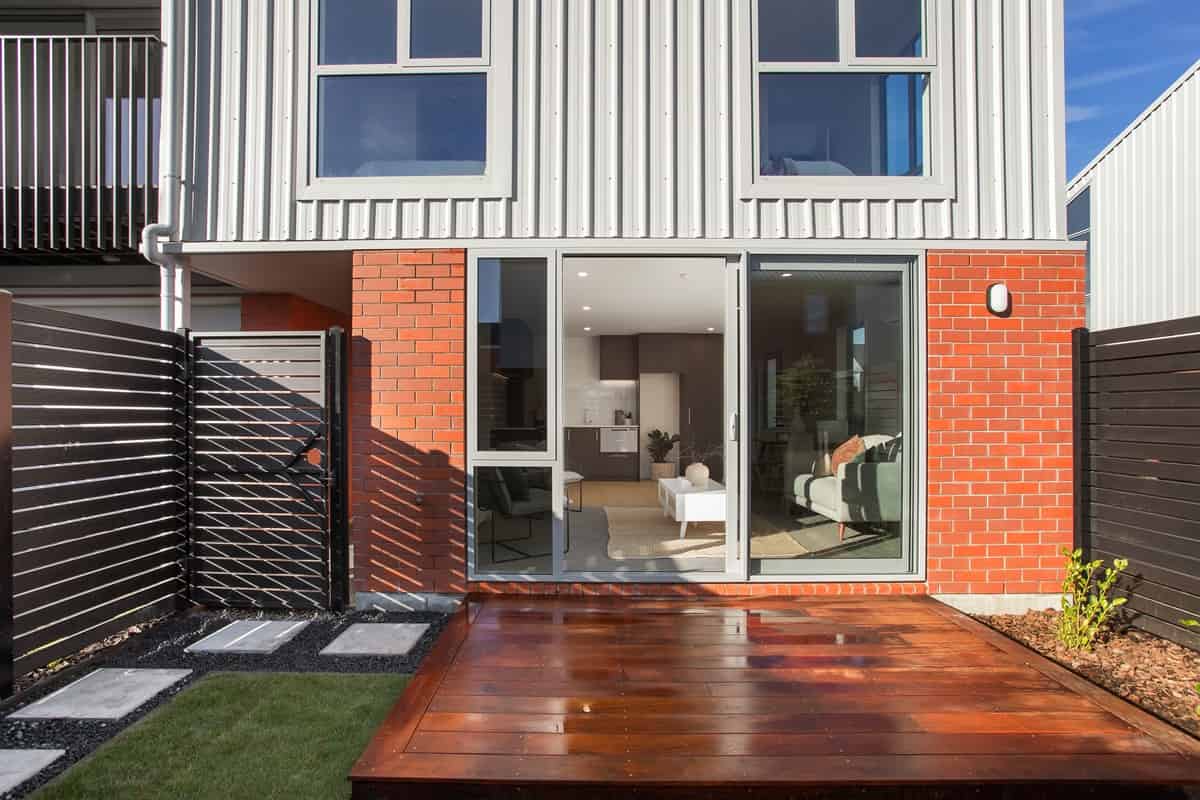 Landscaped courtyard and sliding doors at 5/139 St Albans Street