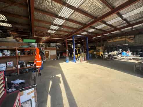 Warehouse, yard, office and showroom.
