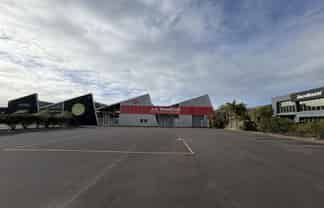 Large Industrial Facility with Extensive Parking