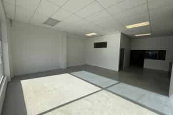 Central showroom with warehouse and parking