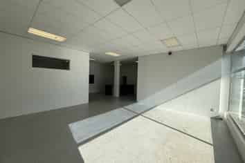 Central showroom with warehouse and parking