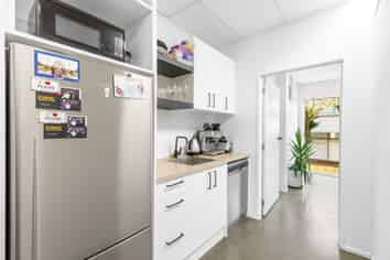 Ground floor corner office/service retail