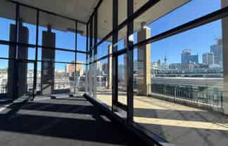DOUBLE-HEIGHT WATERFRONT OFFICE WITH VIEWS

