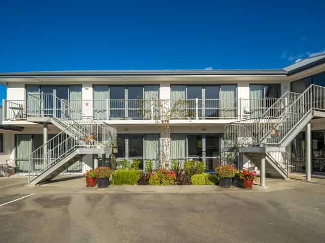 Queen Charlotte Drive. Home & Income Opportunity
