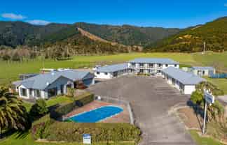 Queen Charlotte Drive. Home & Income Opportunity