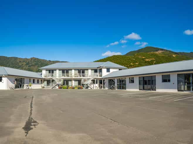 Queen Charlotte Drive. Home & Income Opportunity