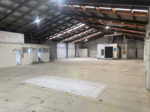Vacant workshop with yard and parking