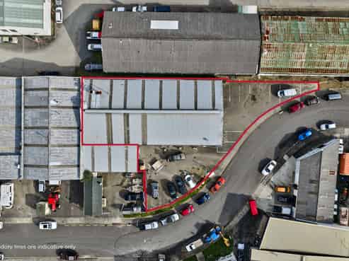 Vacant workshop with yard and parking
