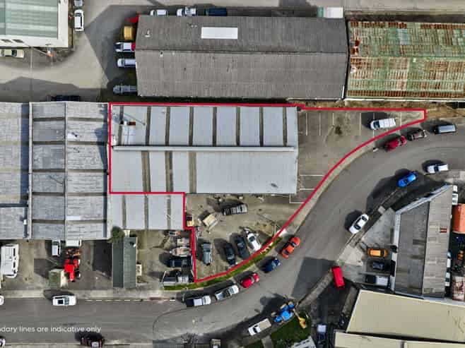 Vacant workshop with yard and parking