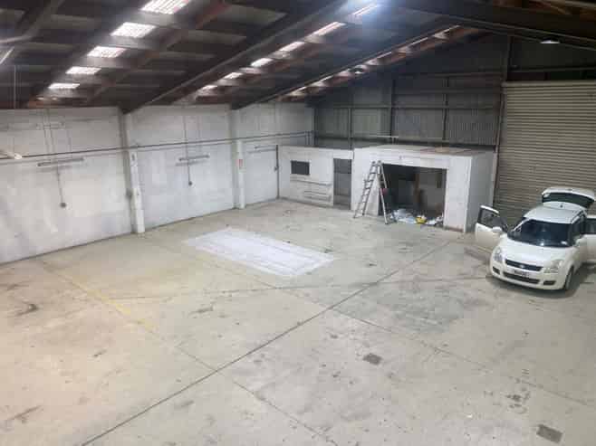 Vacant workshop with yard and parking