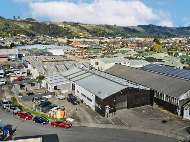 Vacant workshop with yard and parking