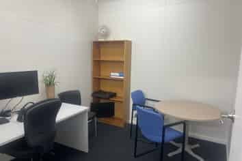 Central office suite with internal garage!
