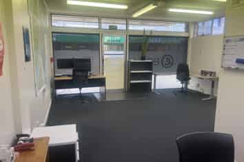 Central office suite with internal garage!