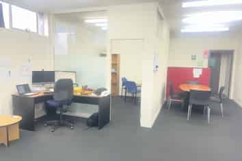 Central office suite with internal garage!