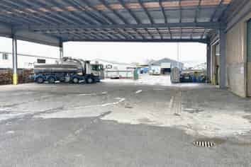 Secure industrial warehouse with extensive yard